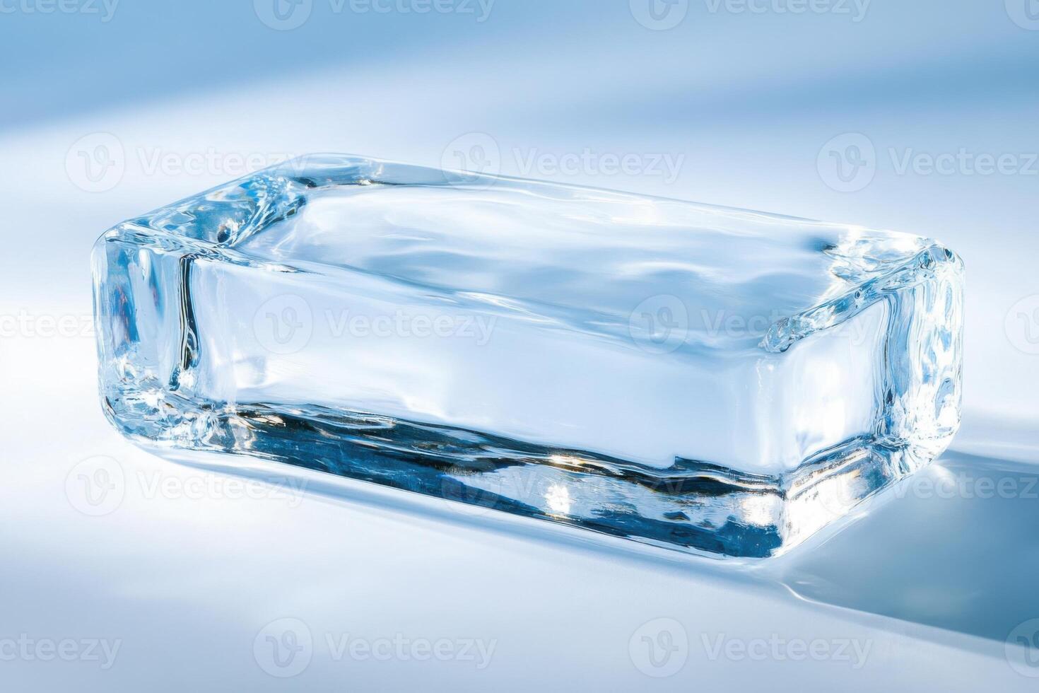 Smooth ice block with frosty textures illuminated by soft blue and white tones creating a cool aesthetic photo