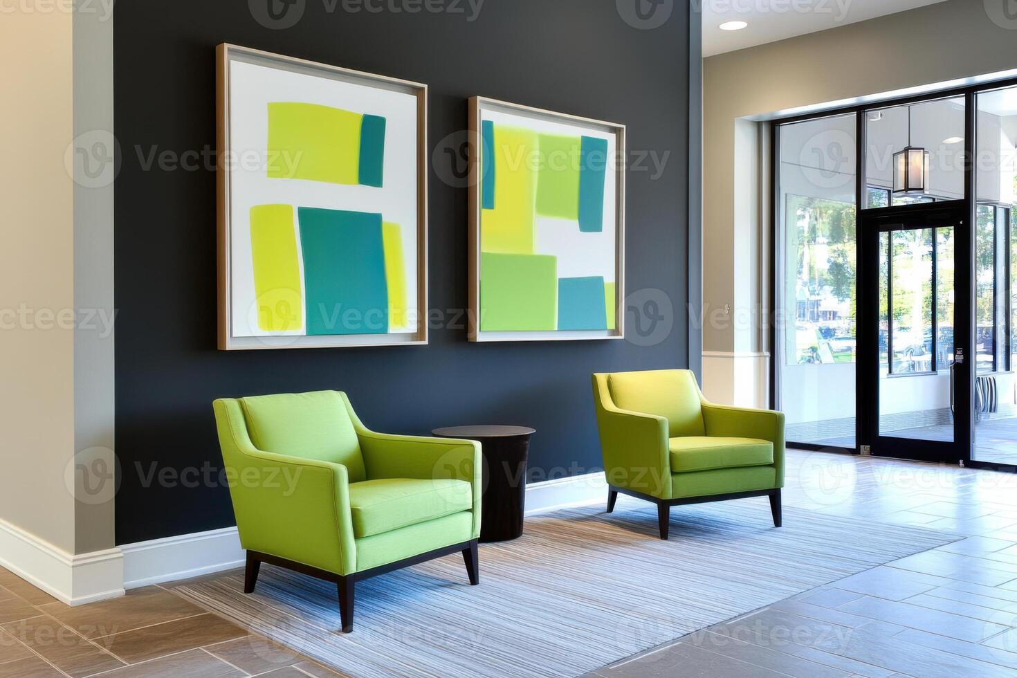 Modern lounge featuring mint green armchairs and abstract art against dark gray walls creates a calming atmosphere for relaxation photo