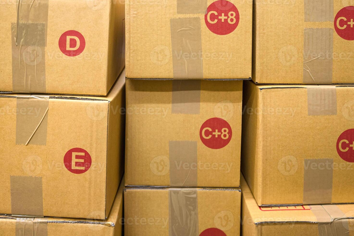 Different sizes brown cardboard box stacked in delivery shop photo