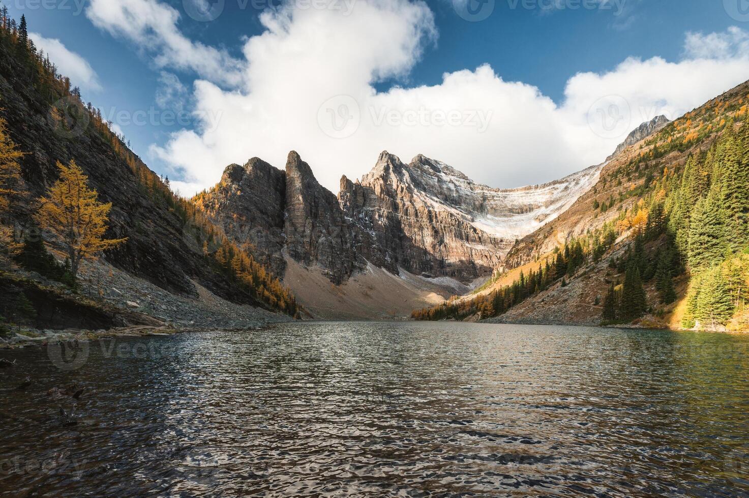 Lake Agnes Tea House with Rocky mountains in autumn forest at Banff national park photo