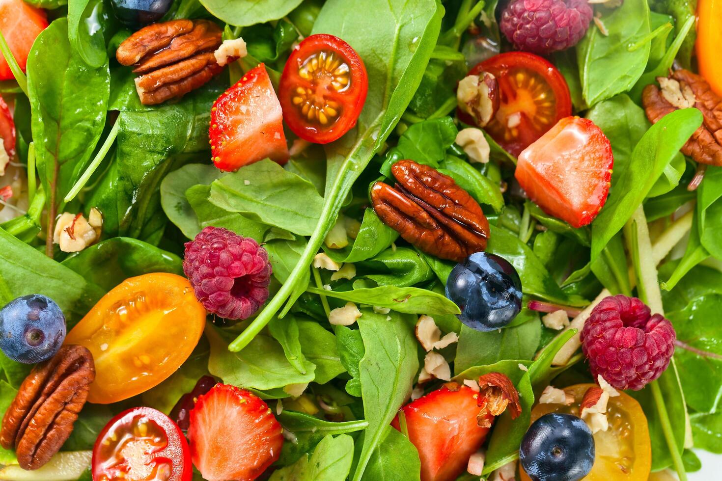 vegan salad with berries and nuts photo