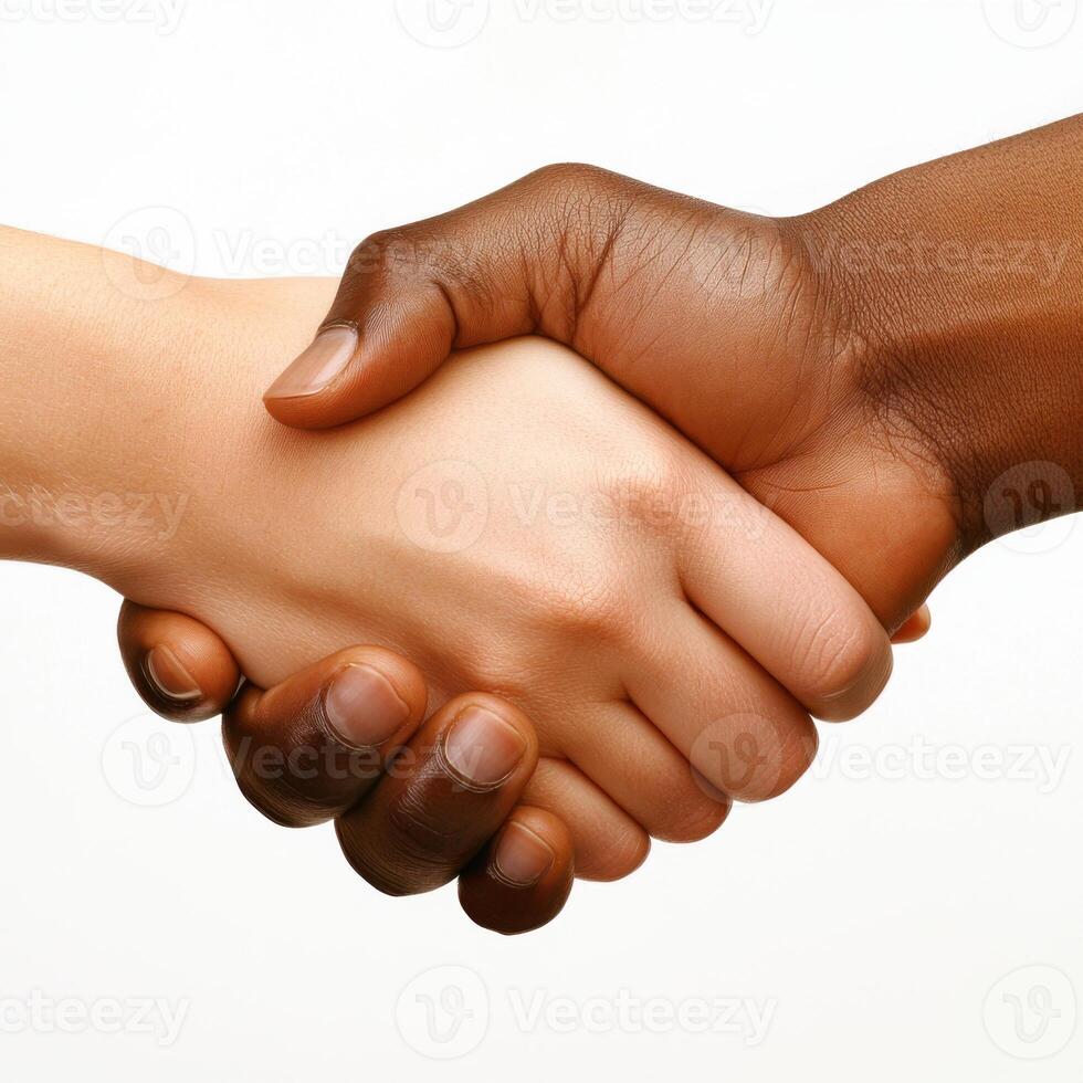 Hands from different backgrounds shake in unity symbolizing friendship and collaboration photo