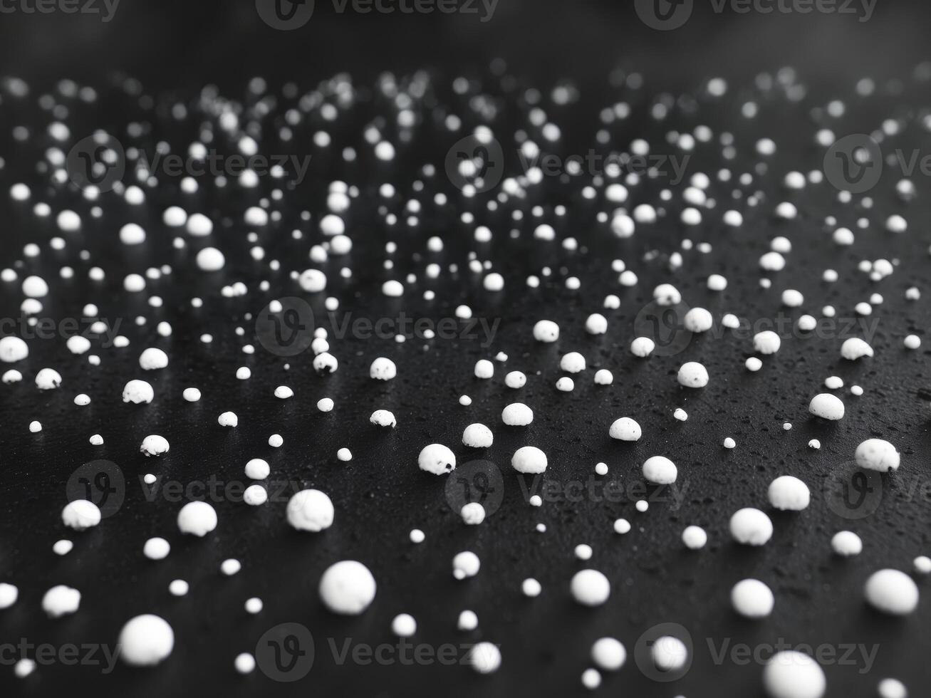 White random dots on black creating abstract grunge photo