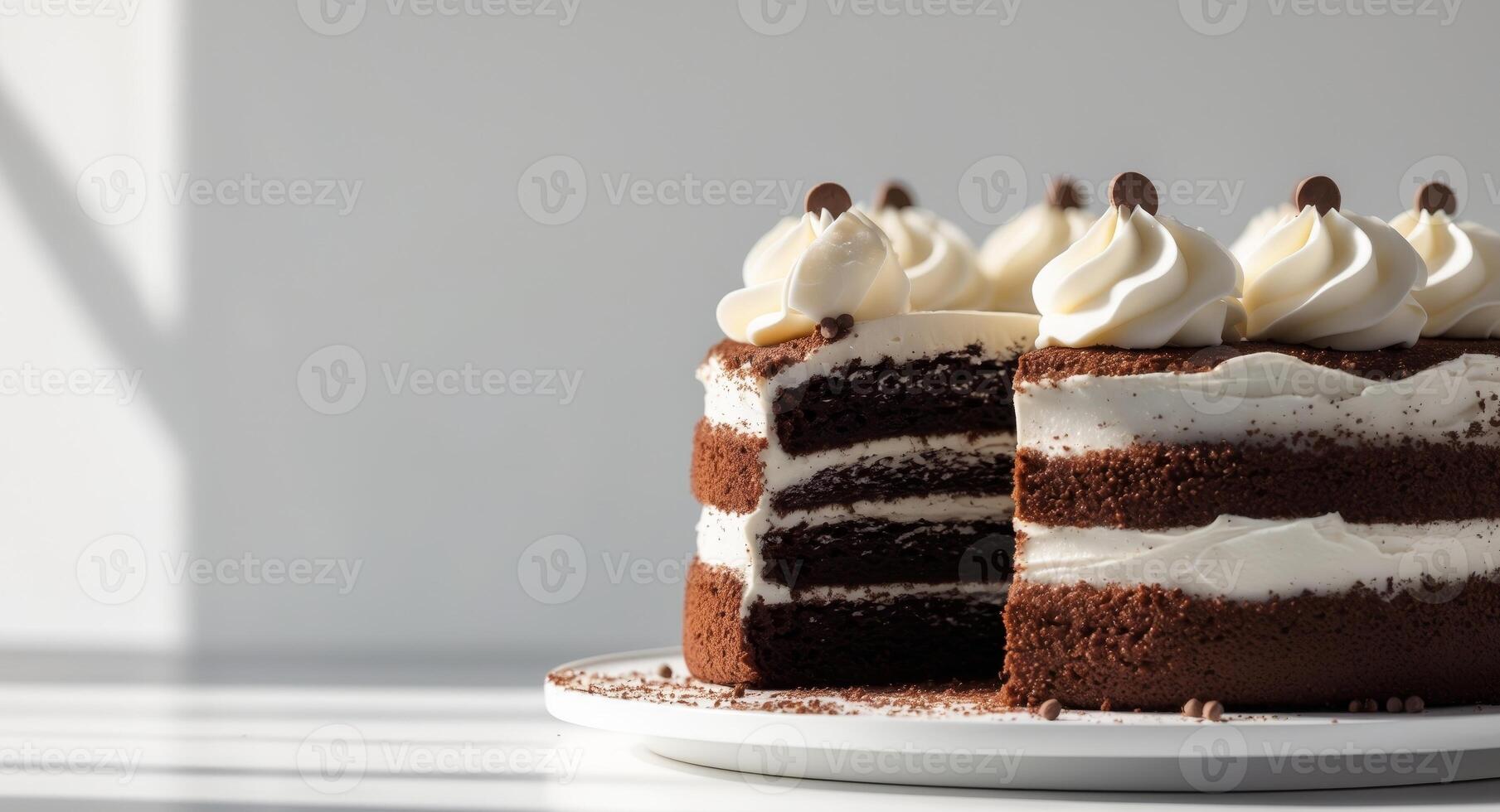 Delicious Rich Chocolate Cake with Creamy Frosting and Decoration photo