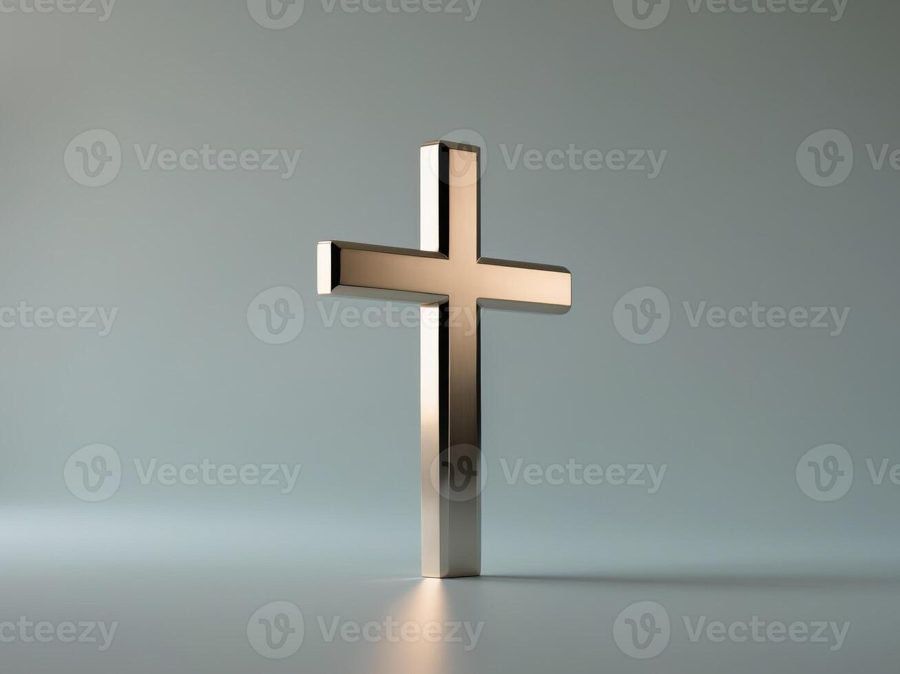 Christian cross in beveled and polished metal. photo