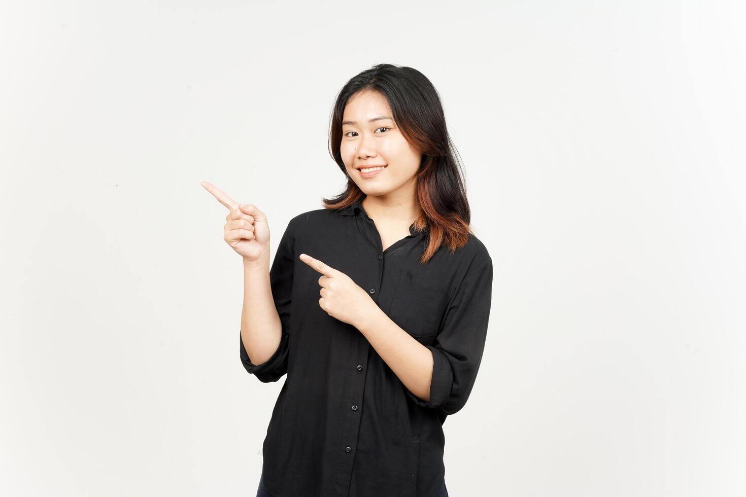 Showing Product and Pointing Side of Beautiful Asian Woman Isolated On White Background photo