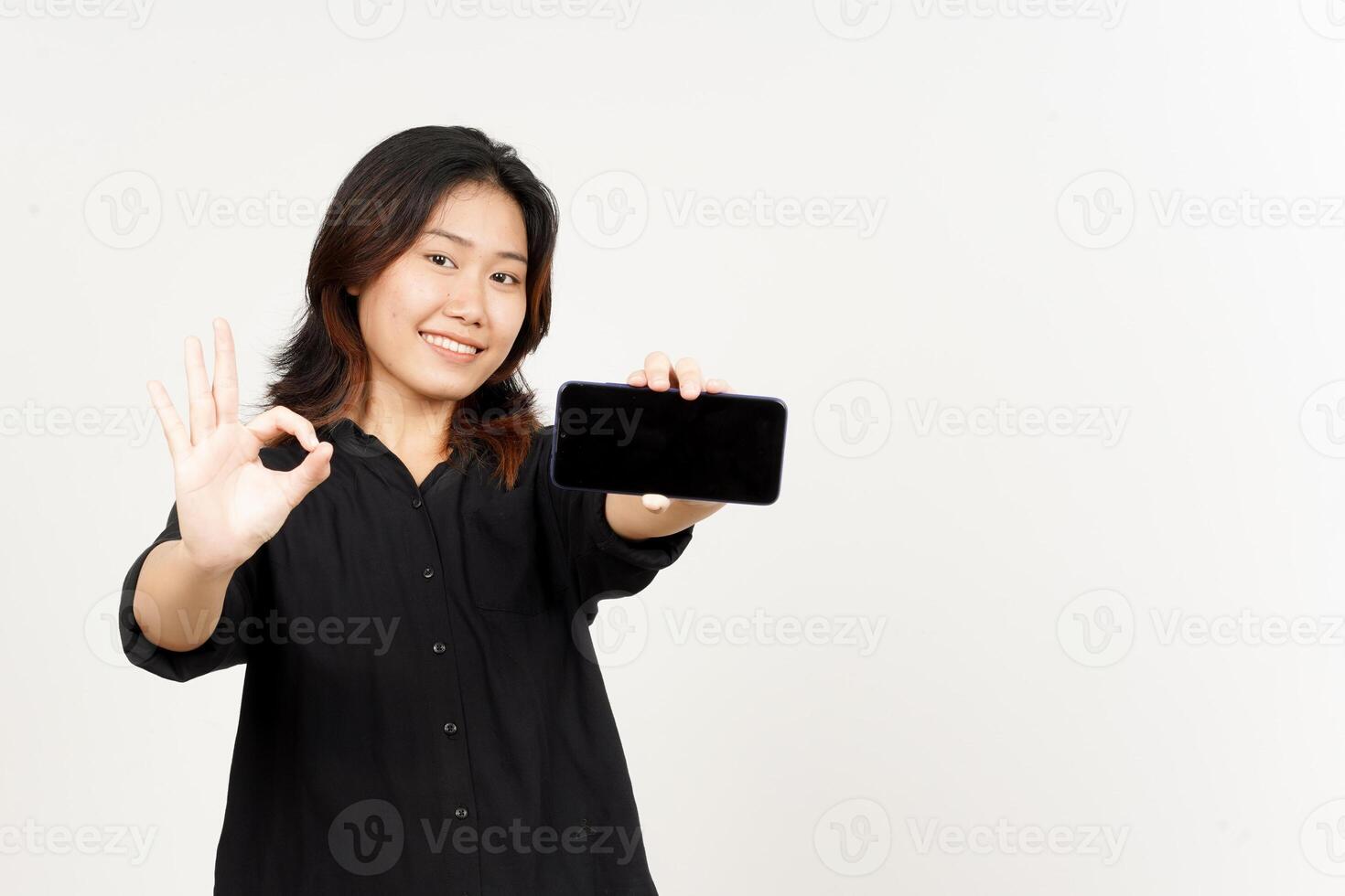 Showing Apps or Ads On Blank Screen Smartphone of Beautiful Asian Woman Isolated On White Background photo