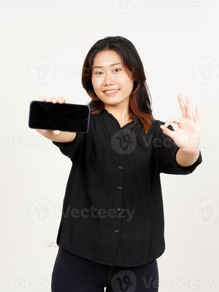 Showing Apps or Ads On Blank Screen Smartphone of Beautiful Asian Woman Isolated On White Background photo