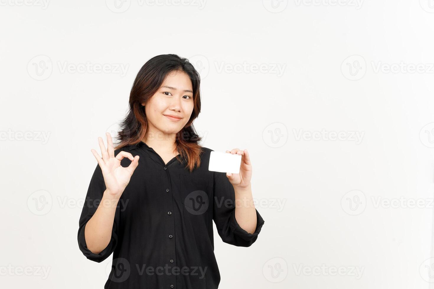 Holding Blank Bank Card Or Credit Card of Beautiful Asian Woman Isolated On White Background photo