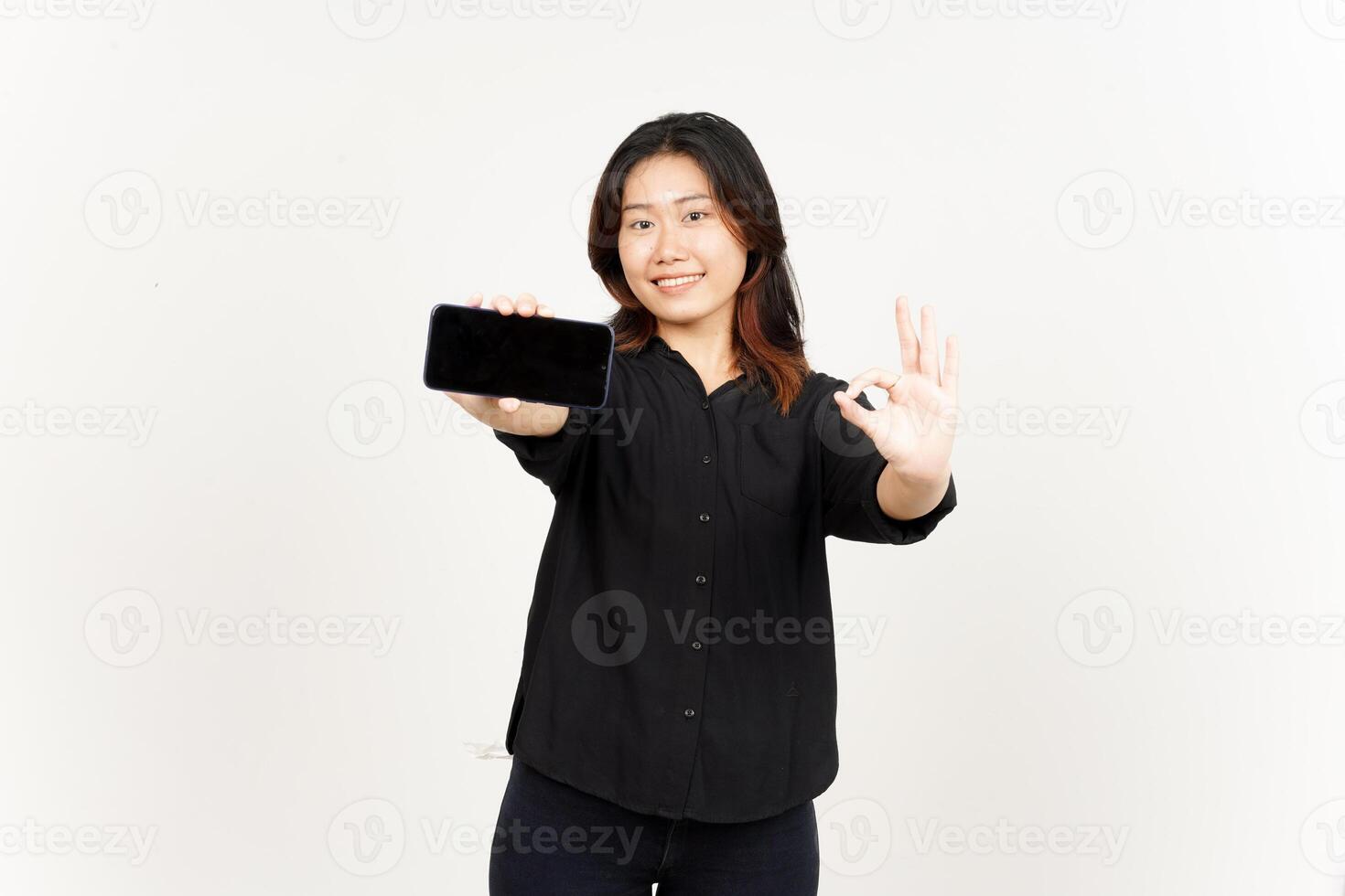 Showing Apps or Ads On Blank Screen Smartphone of Beautiful Asian Woman Isolated On White Background photo