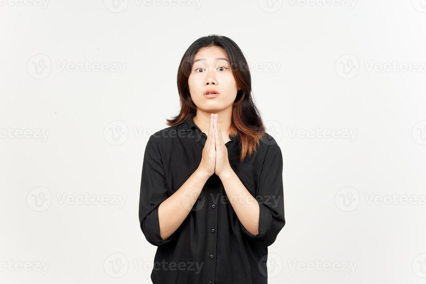 Begging to say sorry of Beautiful Asian Woman Isolated On White Background photo