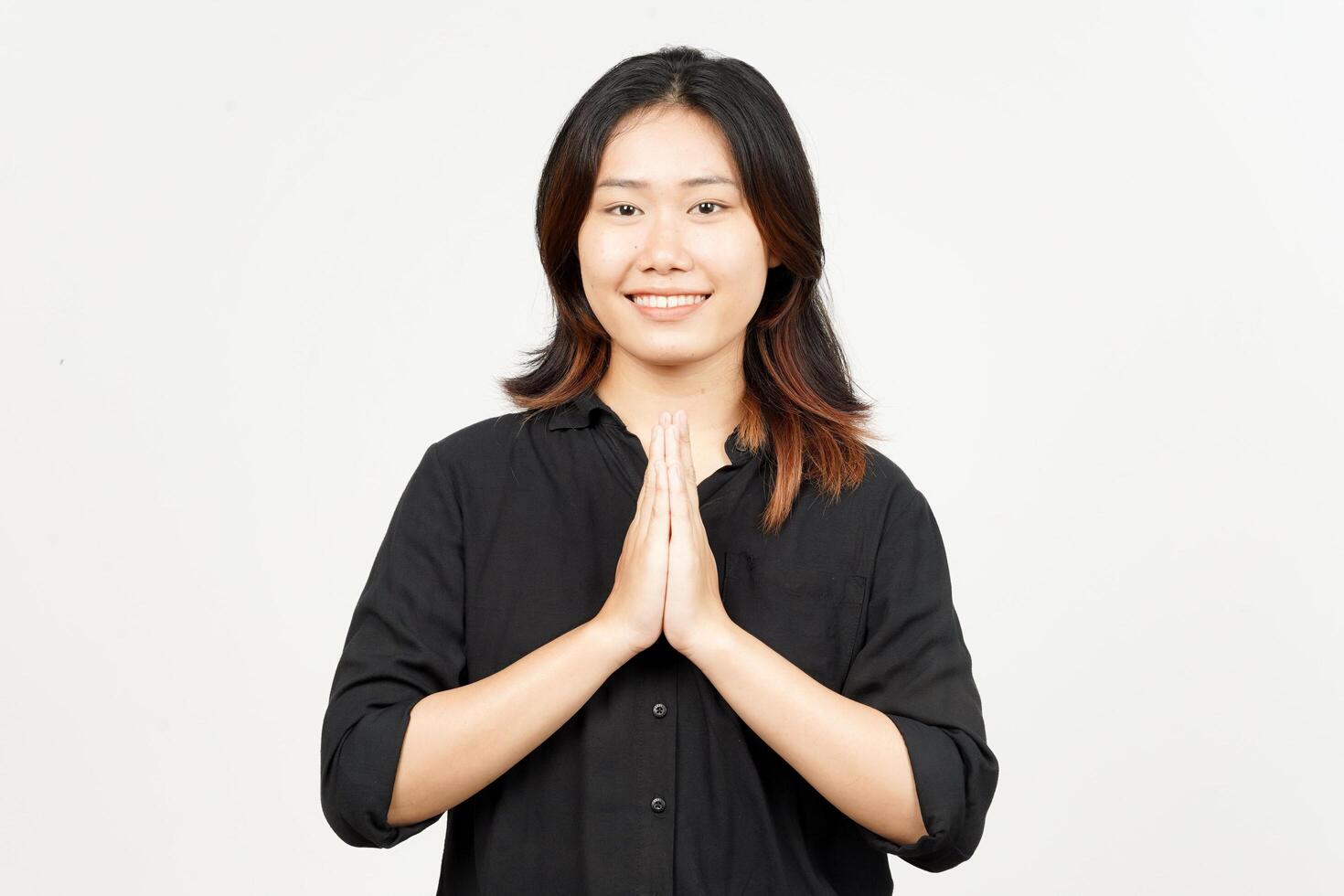 Doing Namaste Greeting of Beautiful Asian Woman Isolated On White Background photo