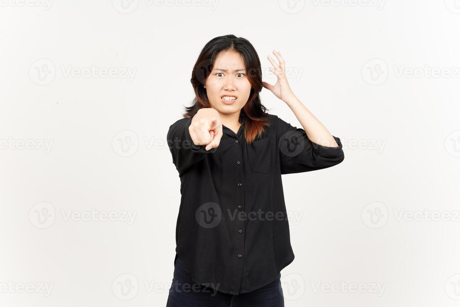 Pointing at camera and angry gesture of Beautiful Asian Woman Isolated On White Background photo