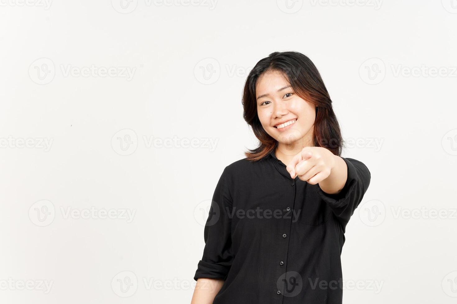 Smiling and pointing at camera of Beautiful Asian Woman Isolated On White Background photo