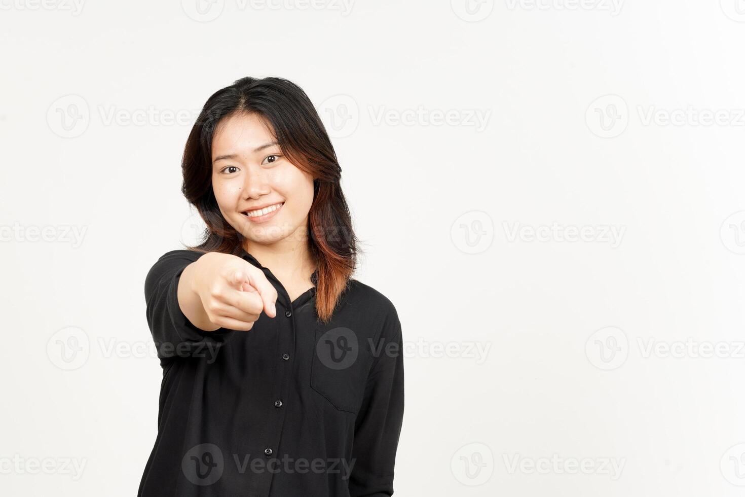 Smiling and pointing at camera of Beautiful Asian Woman Isolated On White Background photo