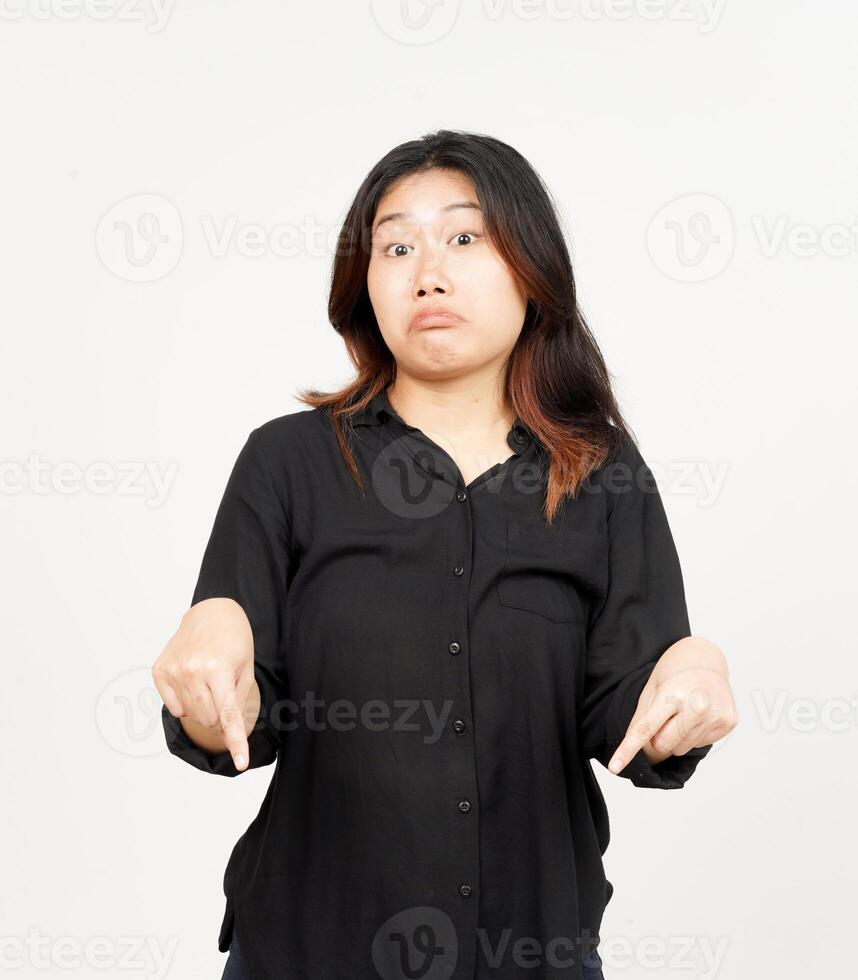 Pointing down and showing blank copy space of Beautiful Asian Woman Isolated On White Background photo