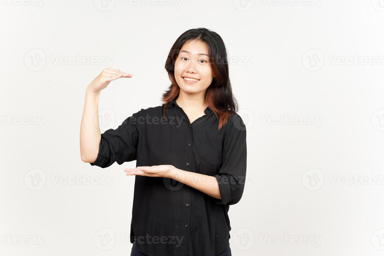 Measuring and Showing Big Sign Product of Beautiful Asian Woman Isolated On White Background photo