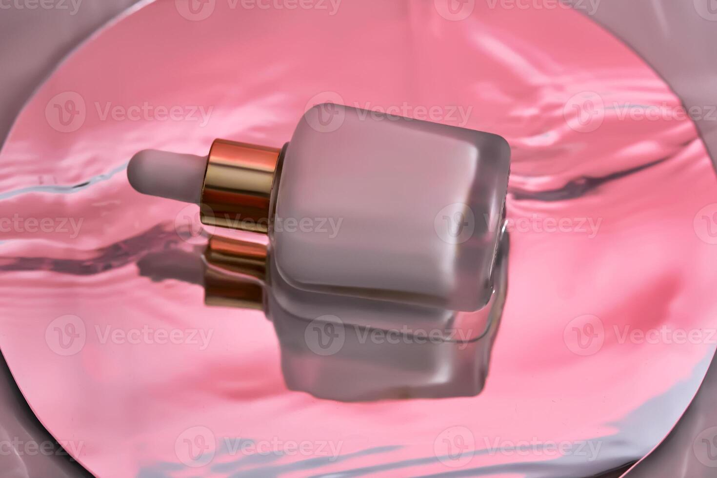 White serum with a pipette in water with a sunset atmosphere. photo