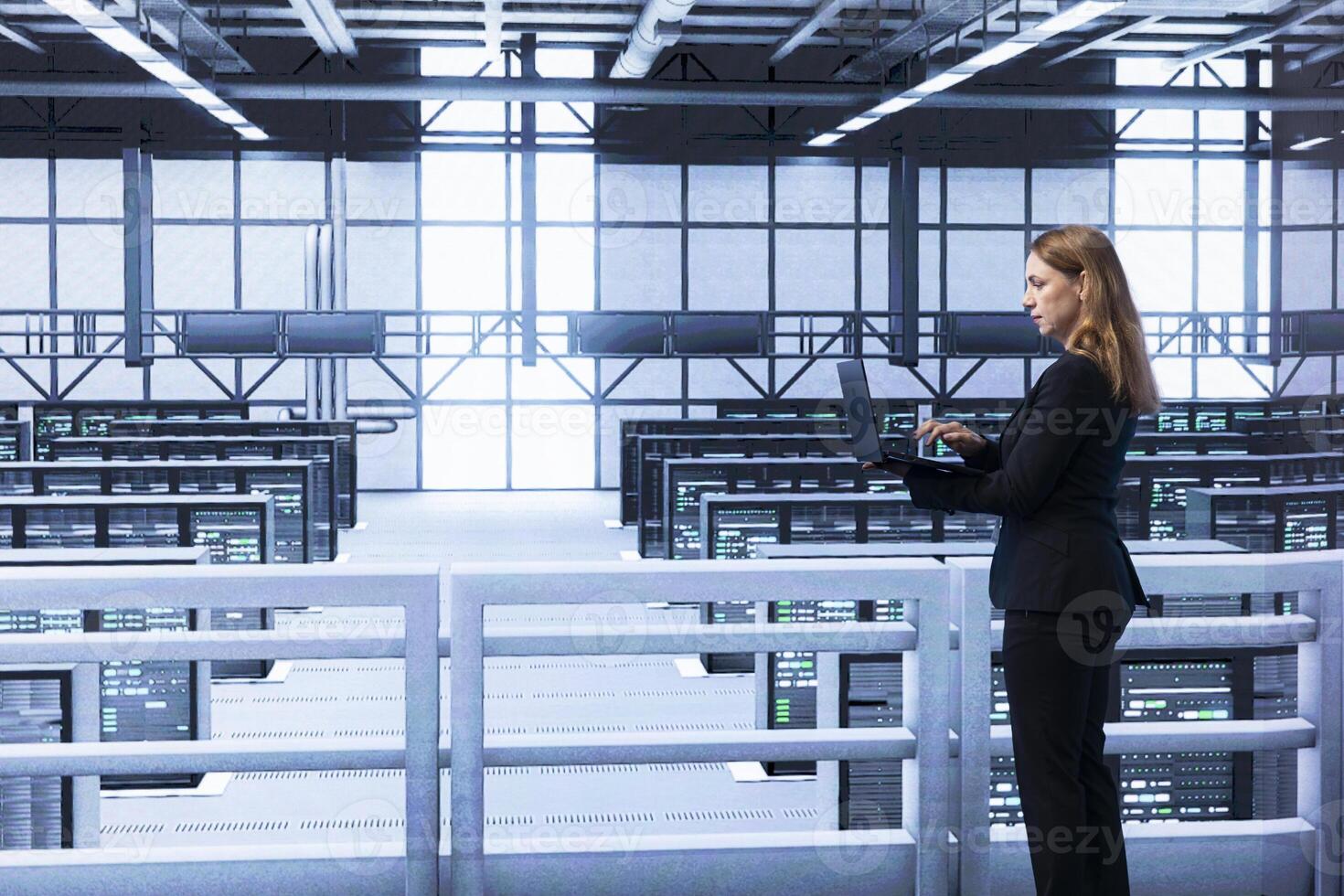 Engineer in data center checking rigs and infrastructure, doing maintenance. IT expert planning and executing high tech server hub facility migrations and upgrades using laptop photo