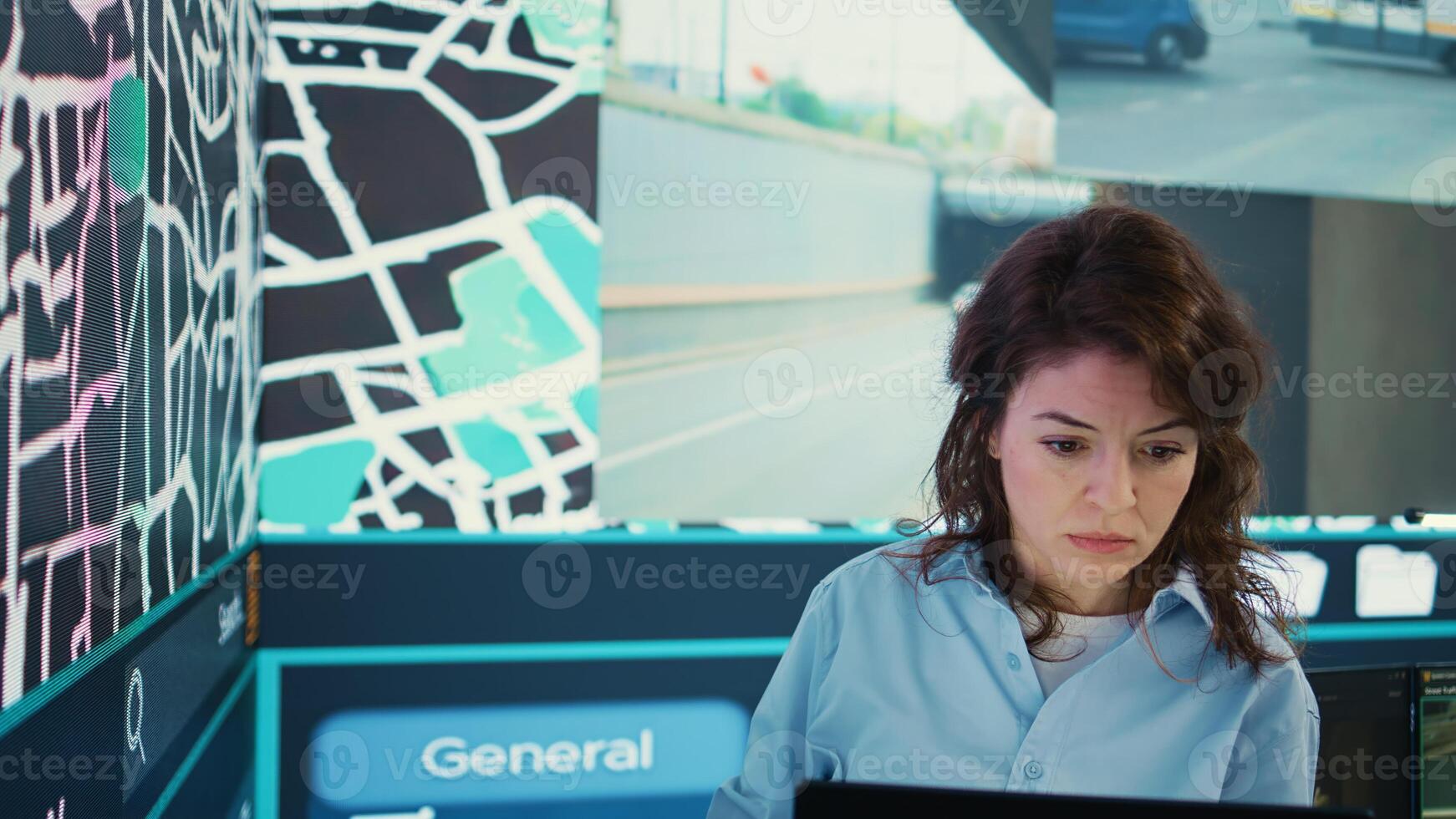 Supervisor following delivery truck route on the satellite map, using gps coordinates and navigation in control center headquarters. Manager overseeing order tracking and shipment. Camera B. photo