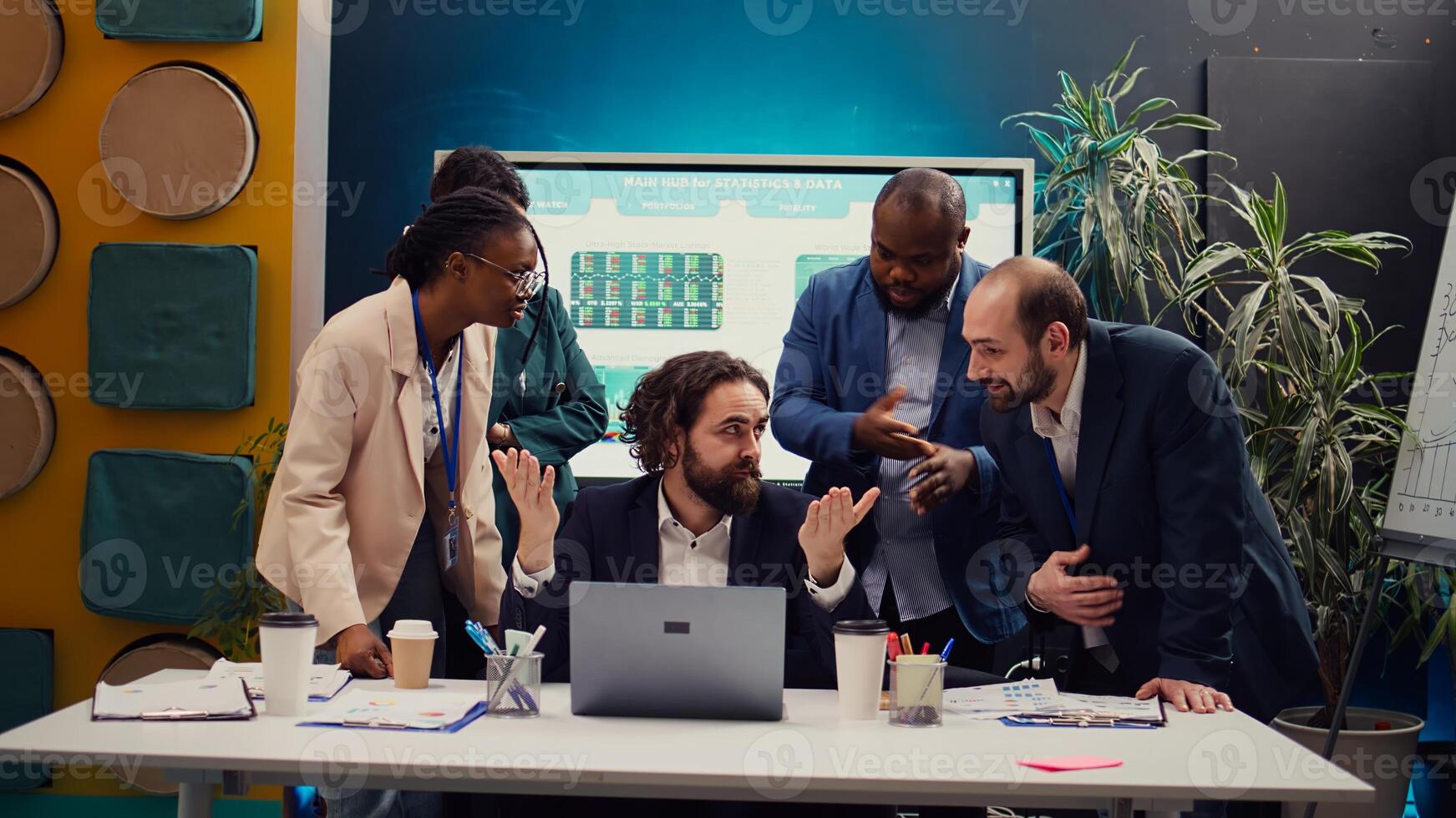 Tired overworked employee deciding to quit his job during important meeting, getting sick of being held responsible by the manager. Frustrated corporate worker leaving conference room. Camera B. photo