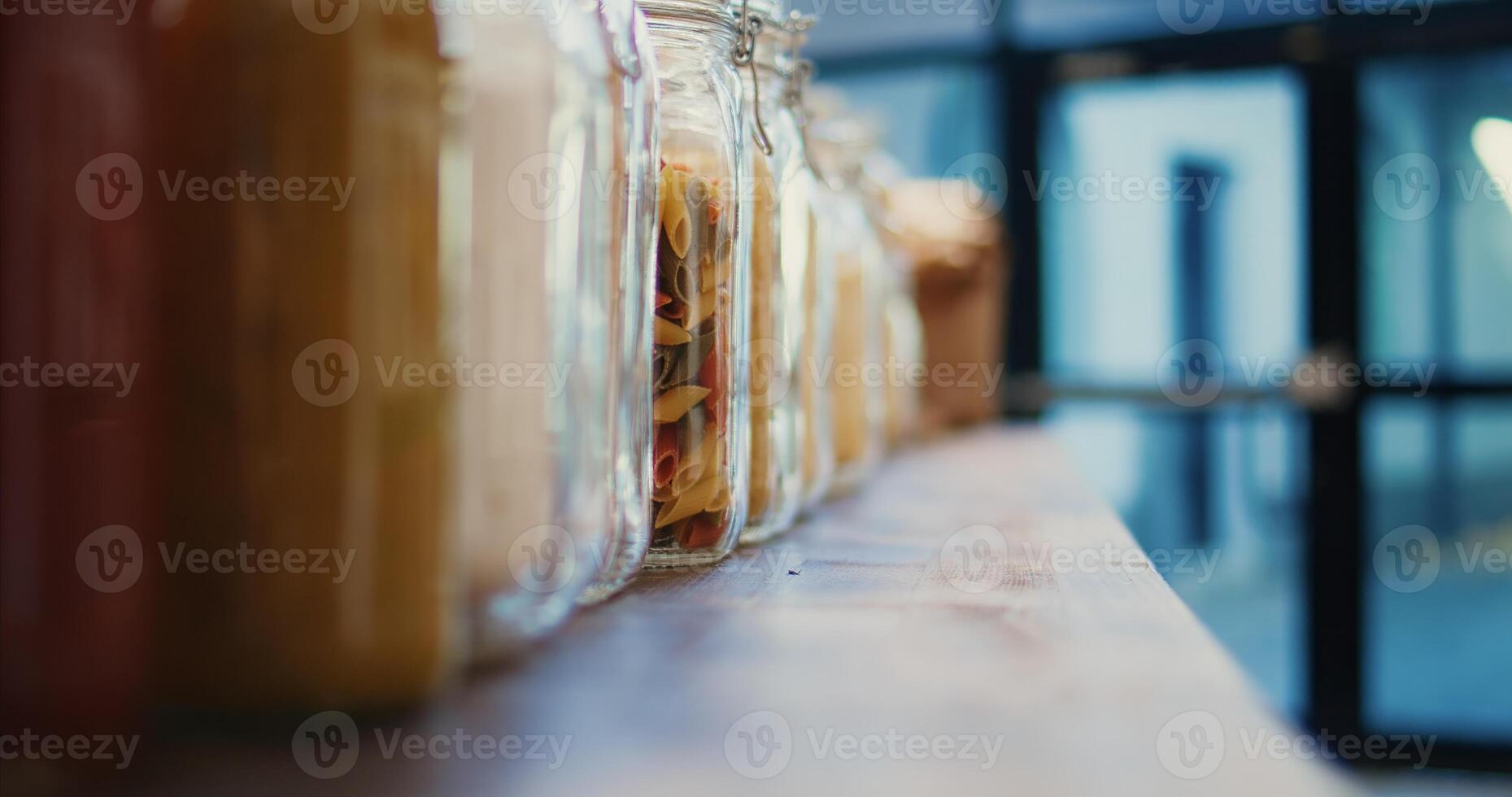 Selective focus of bulk products stored in recyclable jars used to support sustainable lifestyle and vegan nutrition. Zero waste farmers market to lower climate impact. Tripod shot. Close up. photo