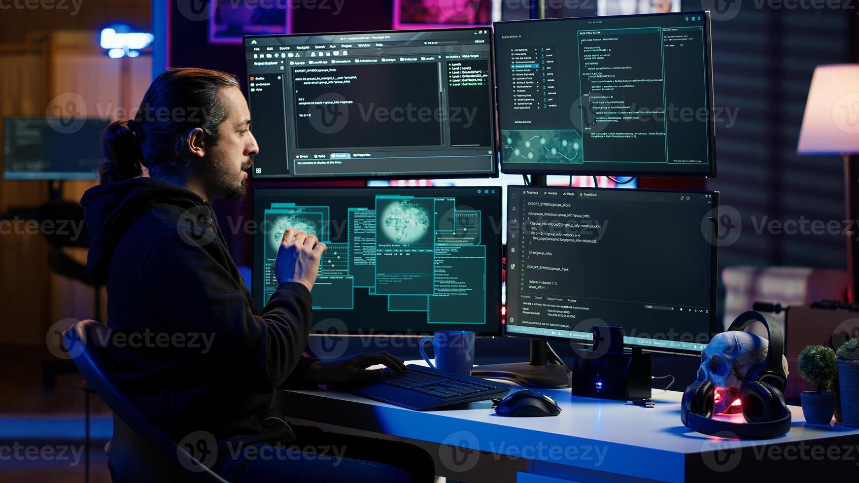 Hacker in secret hideout typing on keyboard, trying to hide online activity after stealing data. Scammer attacking victims computers using malware while trying to avoid being detected, camera A photo