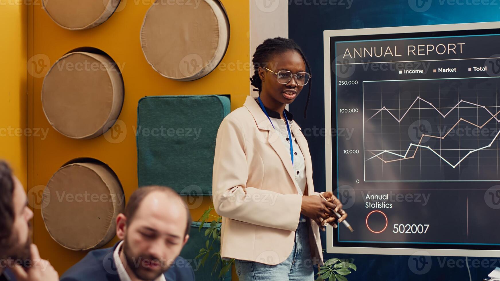 Business employee doing a presentation with project updates and timelines to ensure progress, explaining allocated resources and strategic objectives. Coworkers attend a briefing meeting. Camera A. photo