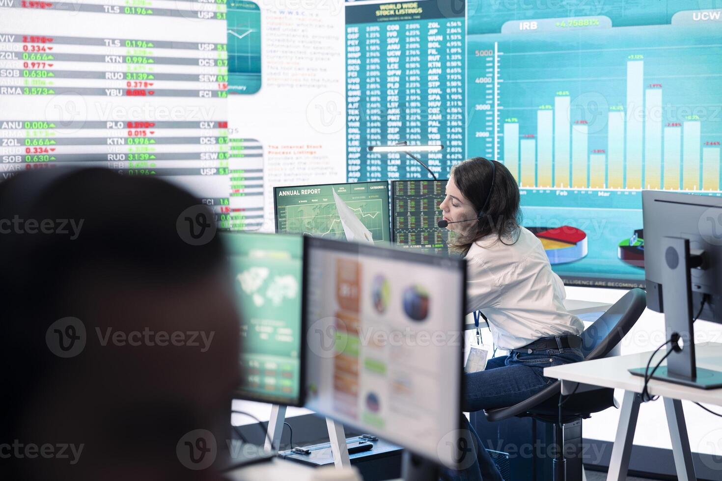 Project leader conducts a market research for progress achievement, understanding the current organizational situation. Consultant working on investments to fulfill company objectives. photo