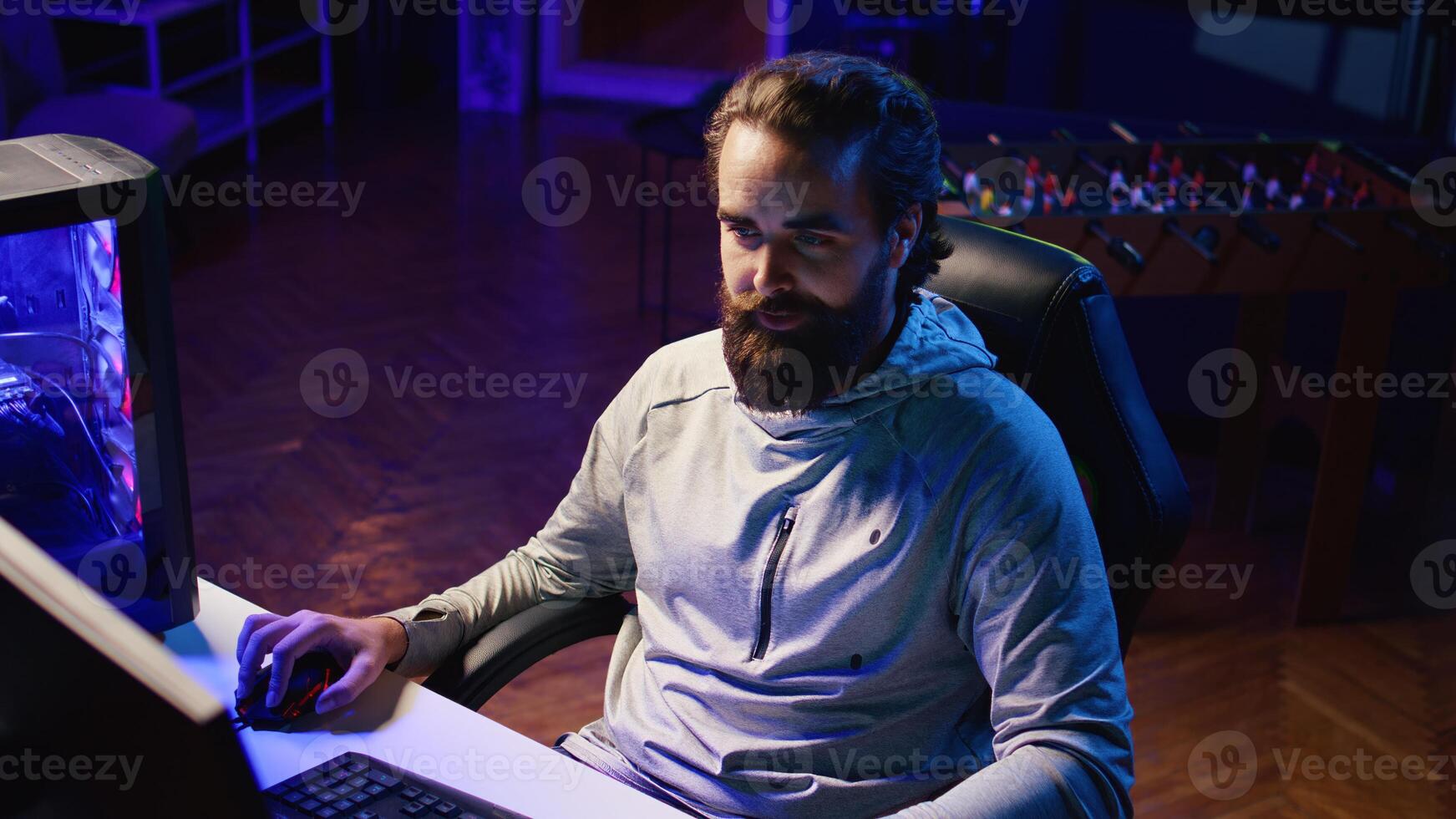 Professional gamer developing strategies for games, showcasing them to gaming community during livestream. Content creator testing different approaches to win videogame while streaming for fans photo