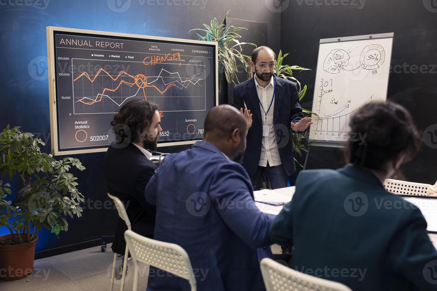 Staff assembling in a conference to debate latest events and updates on project situation, giving insight. Enterprise workers receive instruction to increase the financial business potential. photo
