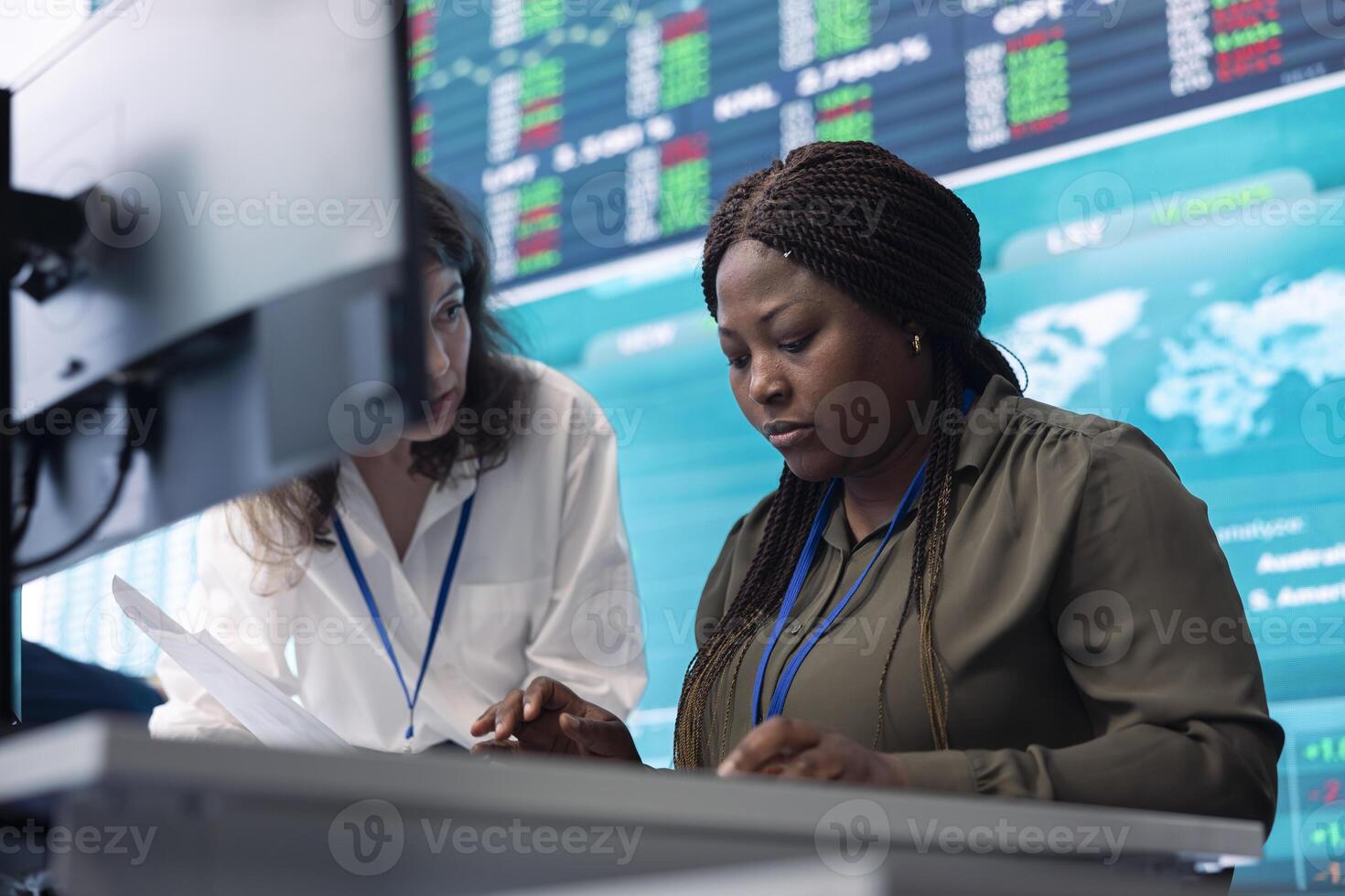 Forecast affiliates deciding new direction to improve business efficiency, reviewing latest enterprise news and progress. Worker and general director working to expand the company. photo