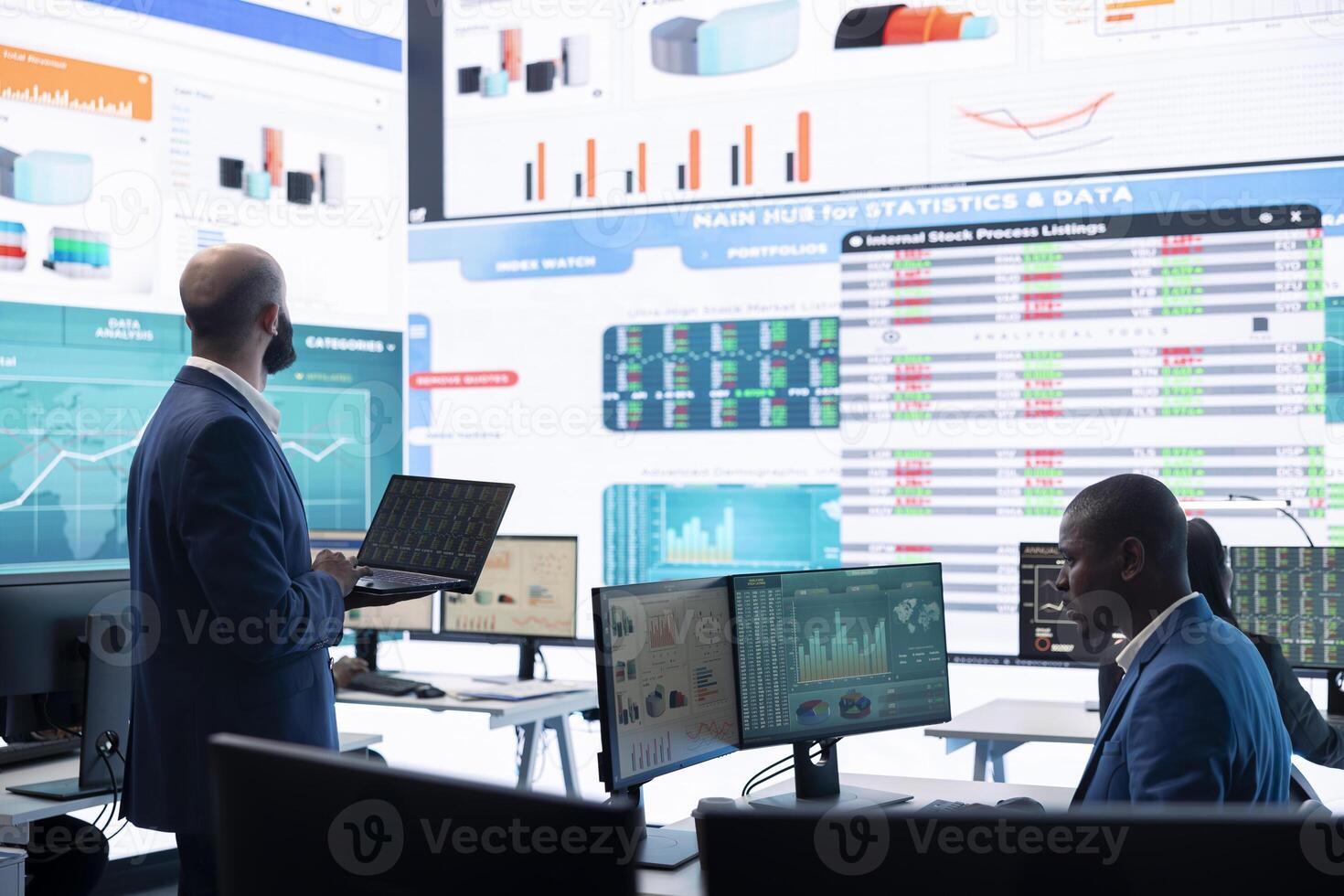 Teammates and manager assembling in a big data room to go over their results, examining graphic representations with feedback from shareholders investors. Exchanging perspectives. photo