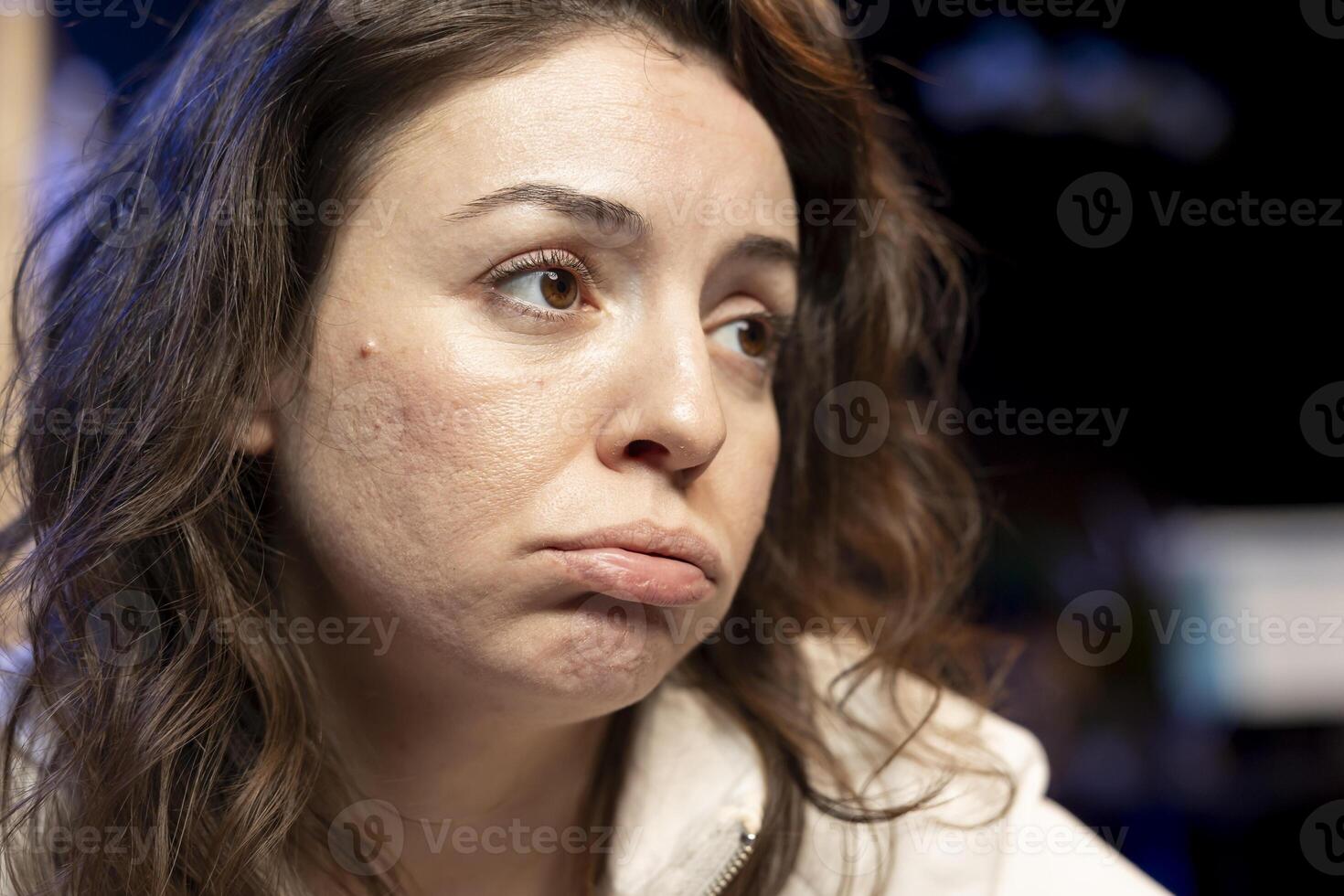 Computer scientist pouting while doing software quality assurance, finding major errors in source code. Close up of sad technician upset after inspecting coding on computer and seeing many issues photo