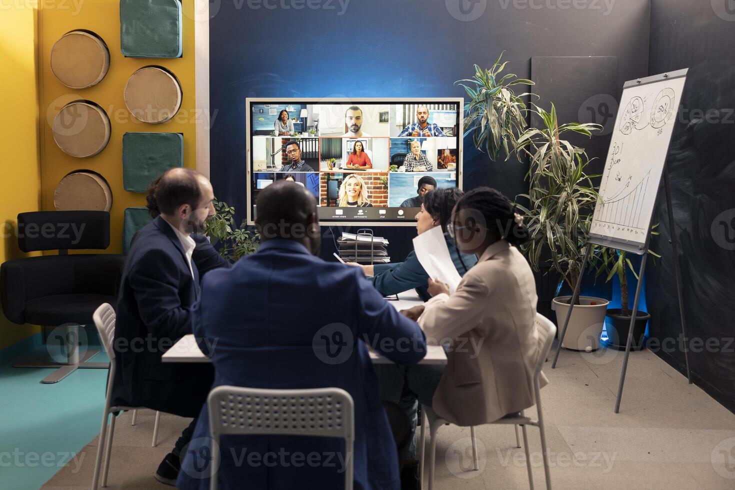 Executive board attending videocall online with shareholders, meeting to address enterprise issues and changes. Business associates making important decisions via telework conference. photo