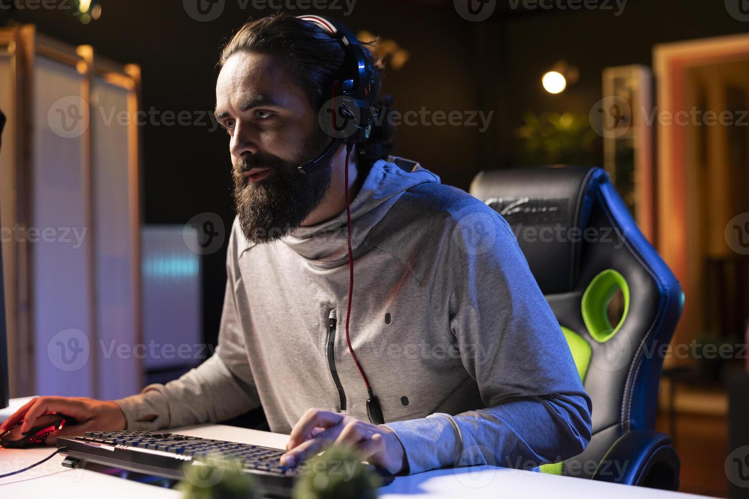Content creator filming himself with webcam while playing, doing intense gaming session, chatting with audience. Gamer teaching audience to play like professional esports players, broadcasting game photo