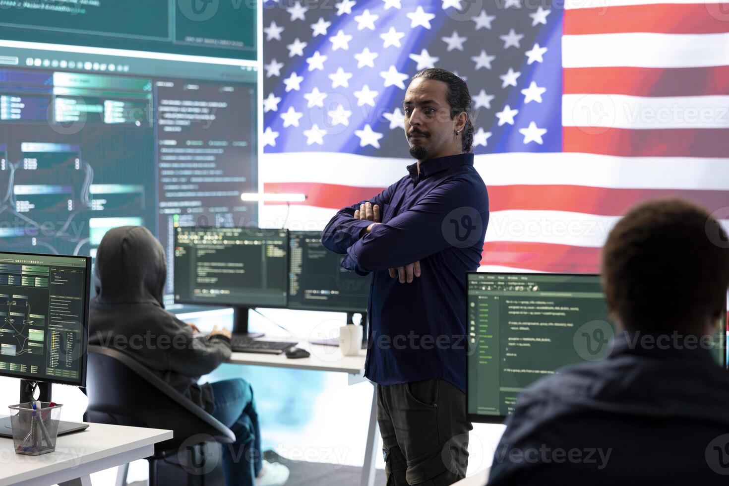 An American hacker in a governmental cyber defense room, showcasing advanced technology and hacking tools. Working on cybersecurity monitoring, digital security and national security. photo