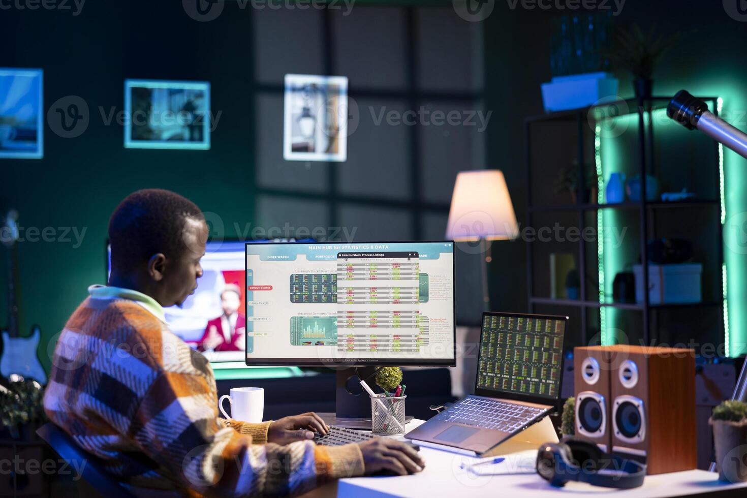 Young financial advisor examines monthly income and expenses to ensure a strategic plan on products and services. African american expert analyzing revenue balance, accounting analysis at home. photo