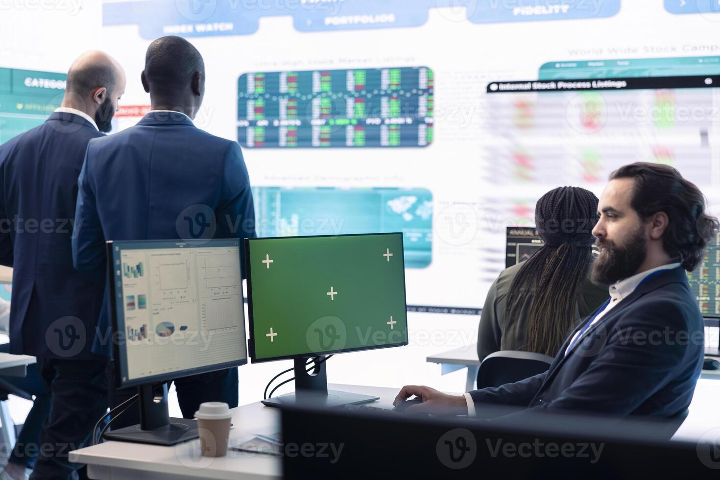 Sales manager examining success and efficiency metrics within the firm, reviews progress details next to isolated display on pc. Administrator evaluating statistics and team productivity. photo