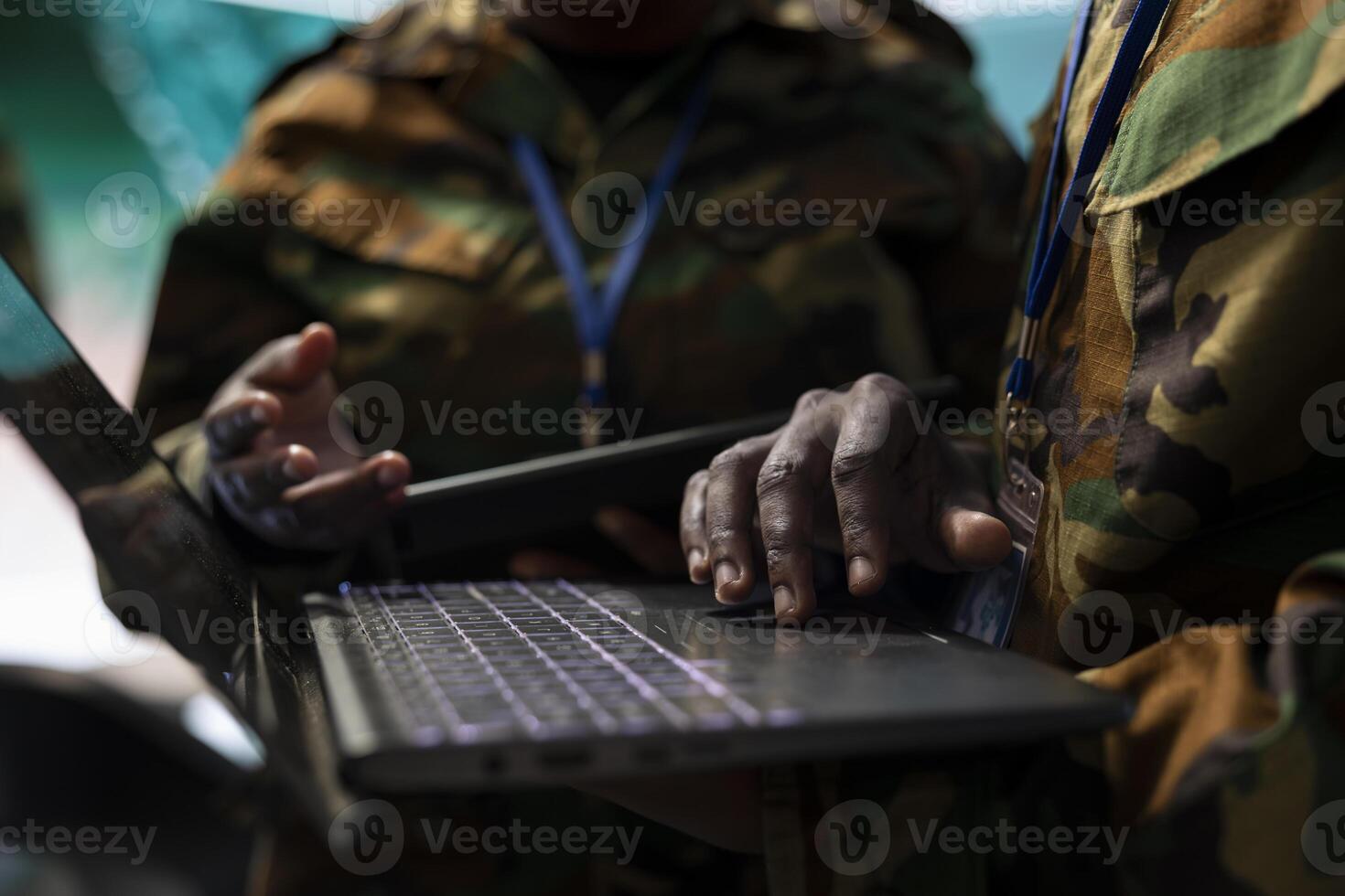 Team of soldiers overseeing air and sea traffic activity for military operations success, working together in government division command center. National surveillance satellite radar system. photo