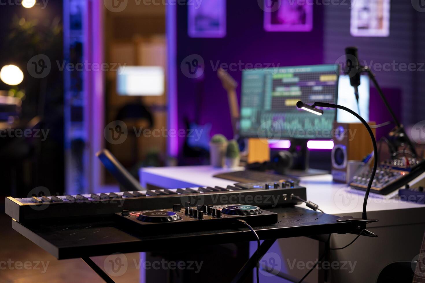 Empty home studio used to produce music and tunes with electronic devices, acoustics instruments and soundboard with control panel. Space equipped with amplifier and mixing tools. photo