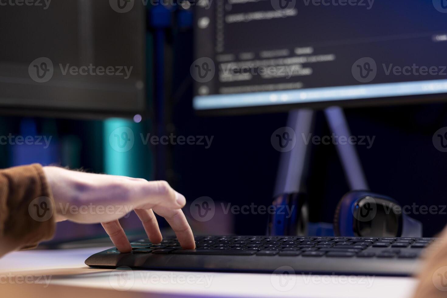 Computer technician working from home, designing and developing software applications. IT specialist typing on PC keyboard, implementing and maintaining company systems, close up photo