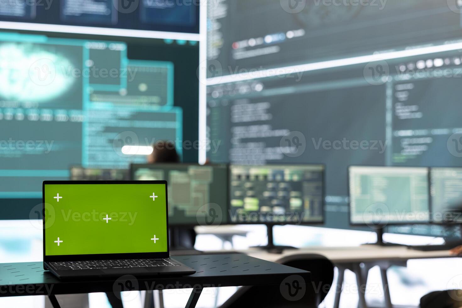 Isolated copy space running on a laptop in high tech agency office, governmental hackers analyzing digital threats on big screens. Working on cybercrime and protection against phishing. photo