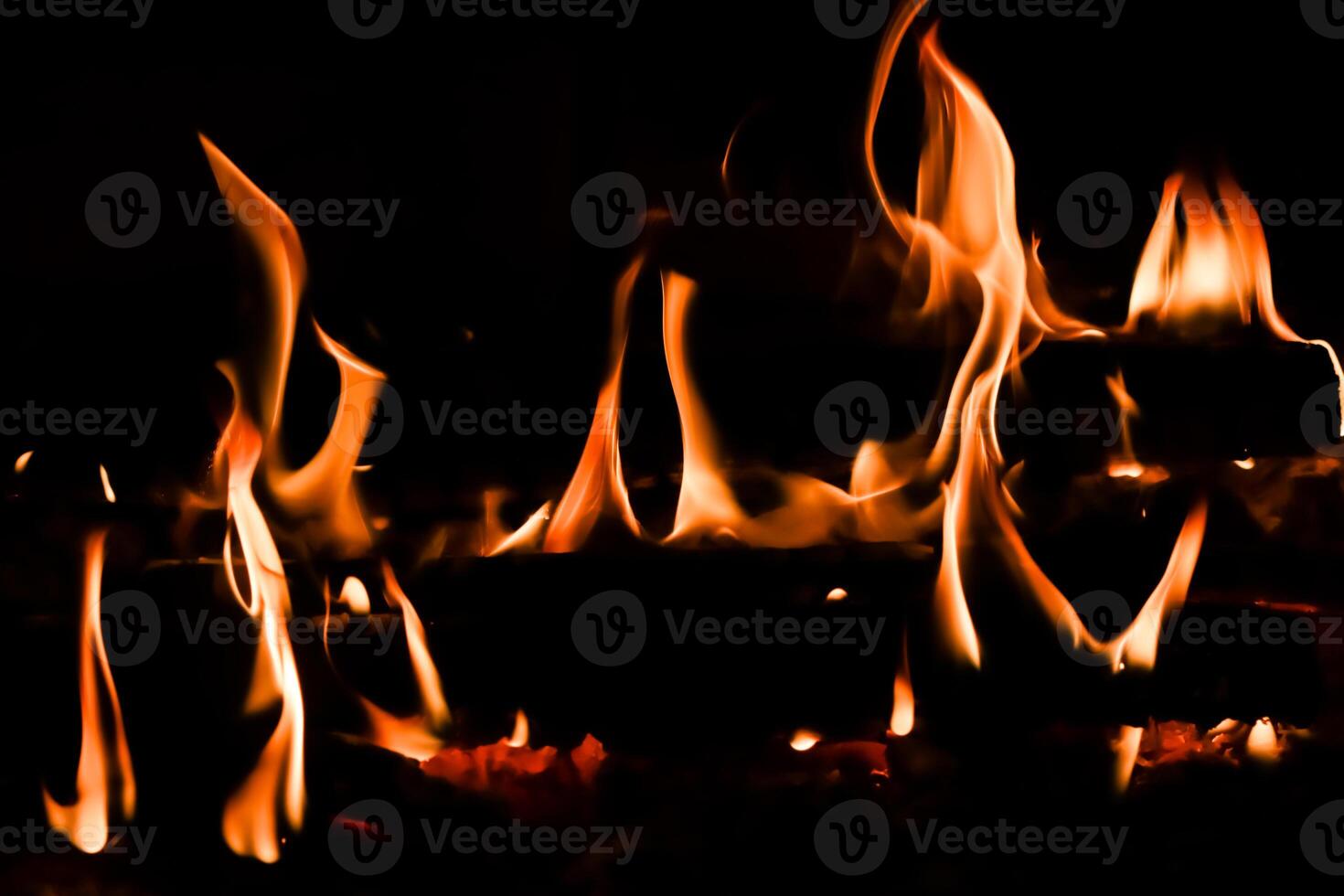 Red blaze Fire flame on a black background photo