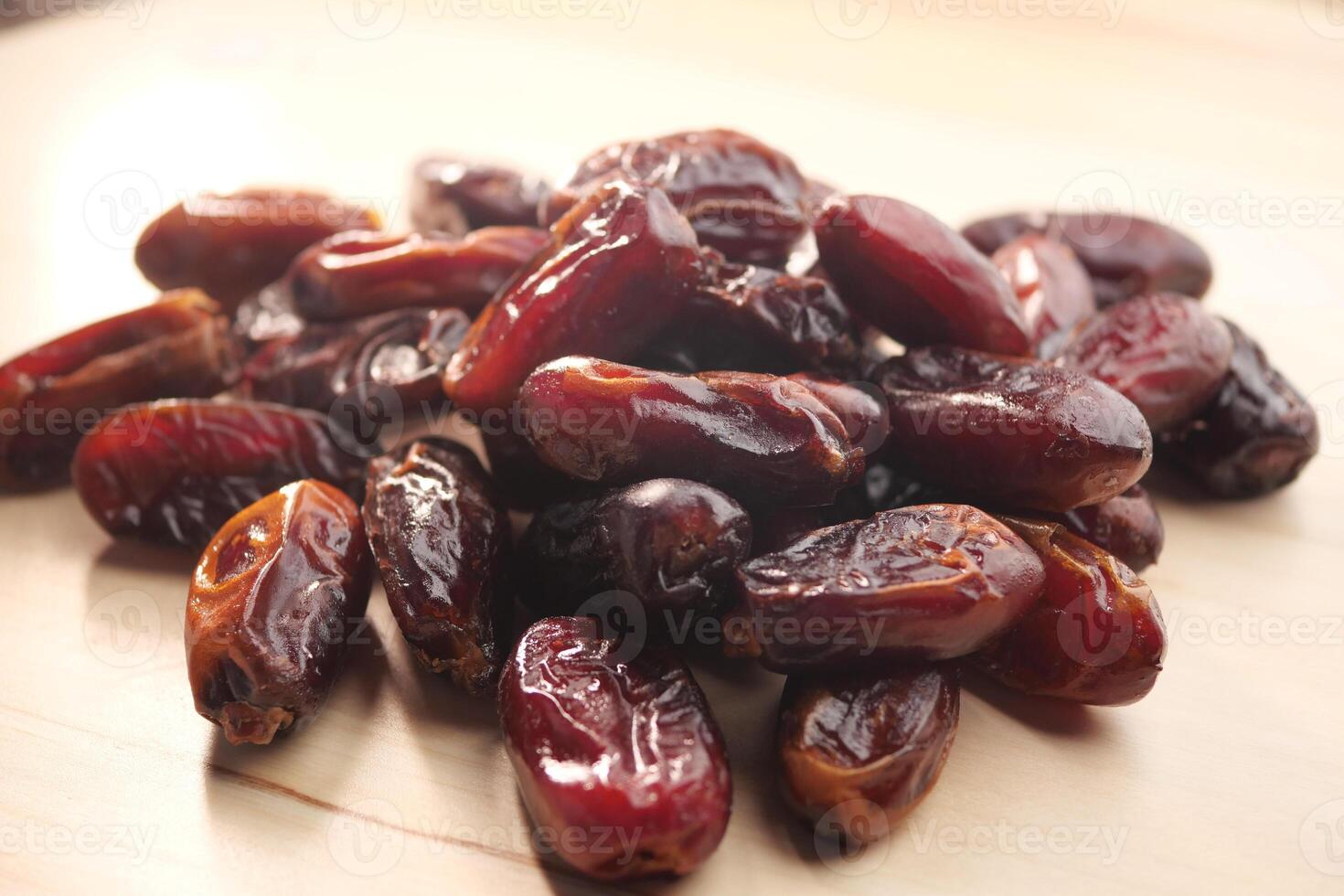 close up of fresh date fruits on a table photo