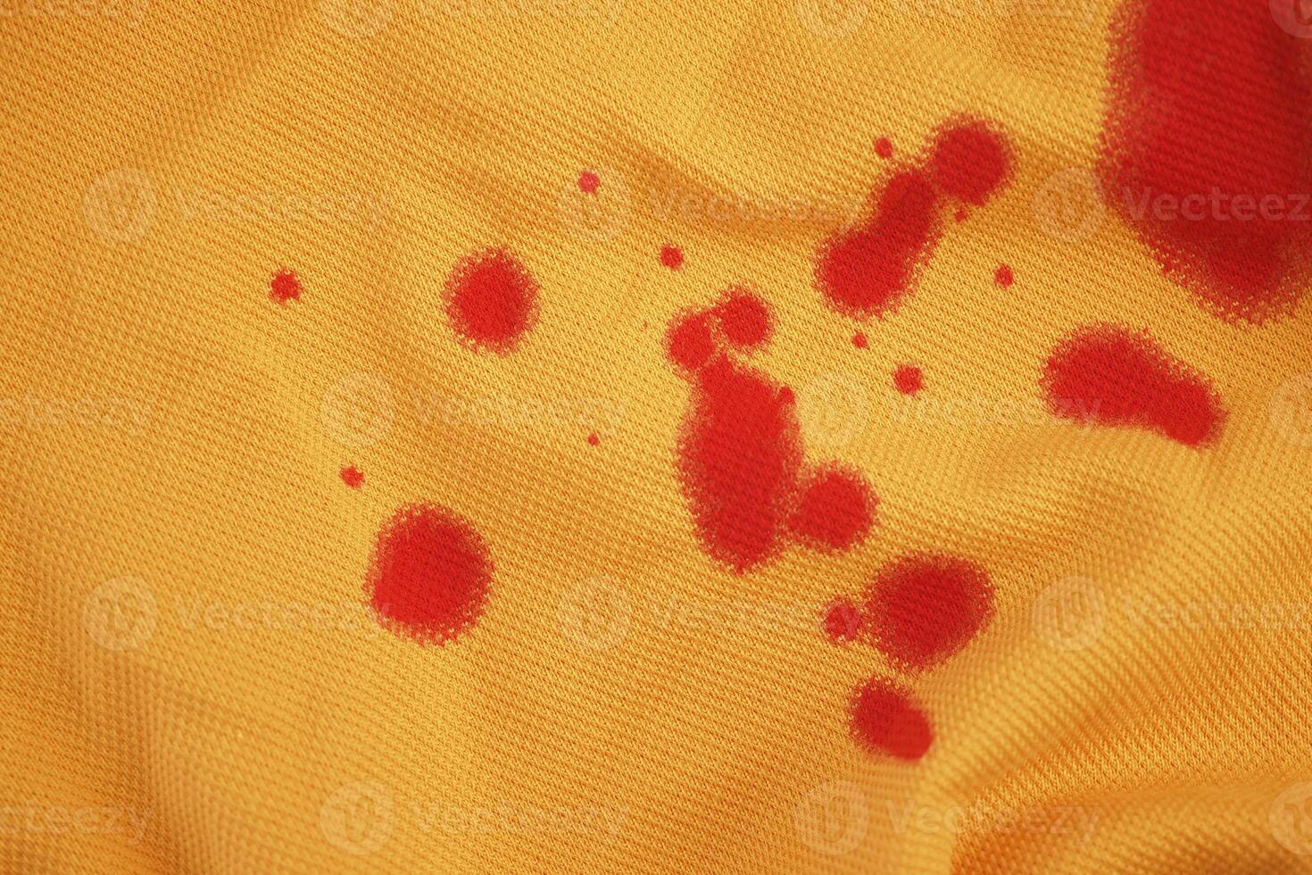 blood stains on a white shirt. photo