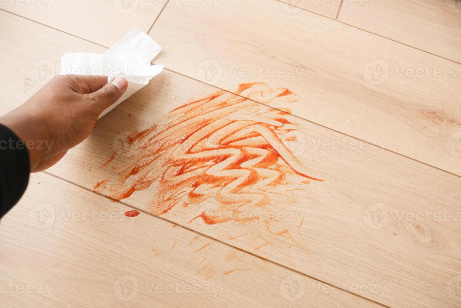 Effortlessly Cleaning a Stained Floor Using a Simple Paper Towel photo