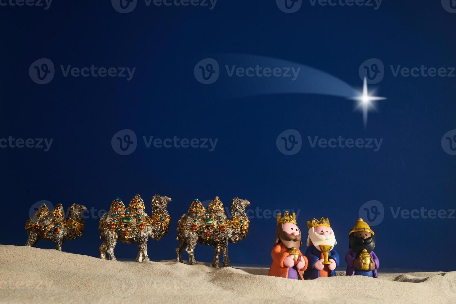 Epiphany. Three Wise Men and decorated camels photo