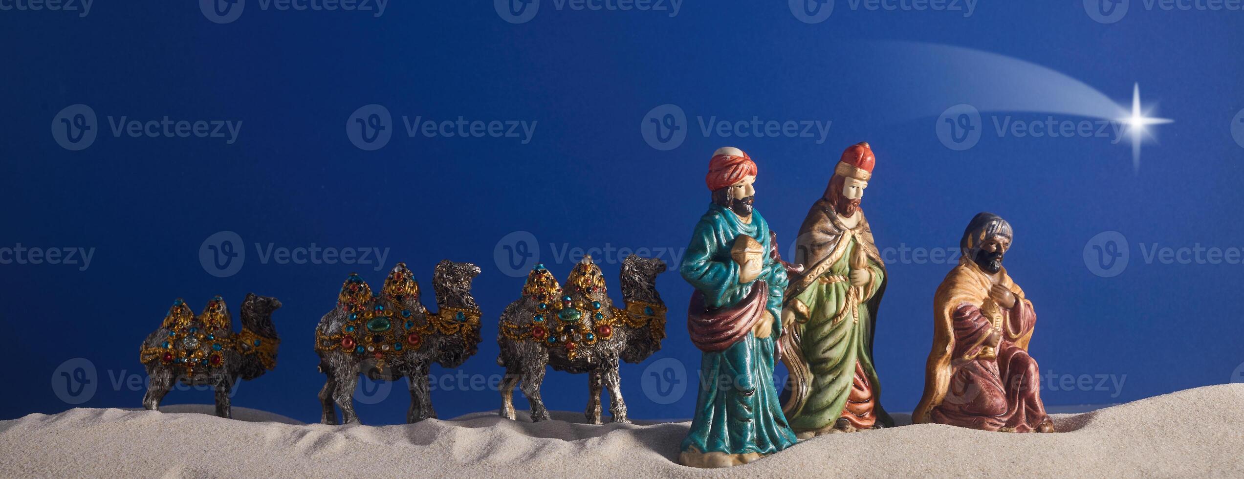 Epiphany. Three Wise Men and decorated camels photo