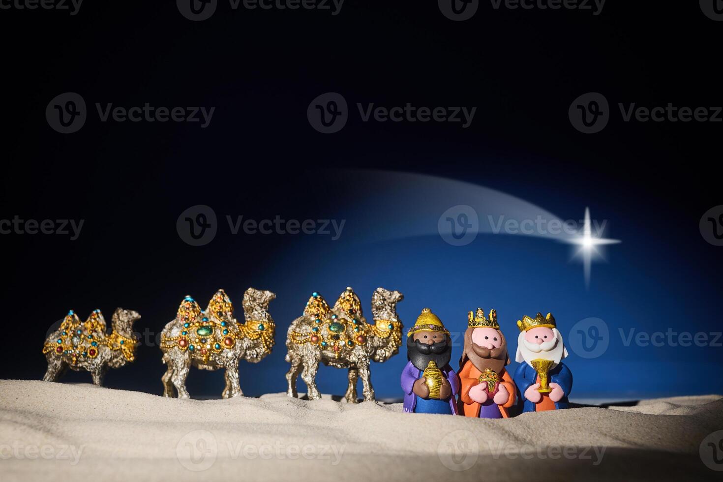 Epiphany. Three Wise Men and decorated camels photo